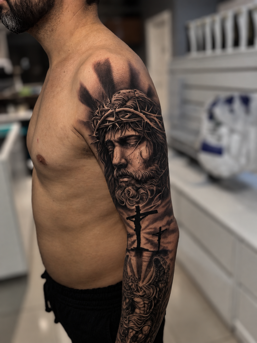Tatuagem realista de Jesus por Cascio